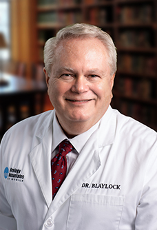William E. Blaylock, MD