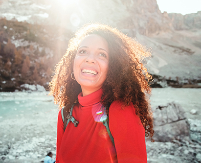 Woman smiling in sunshine